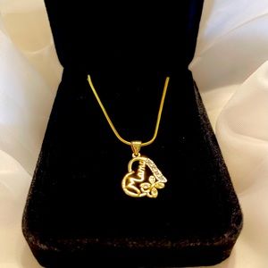 Mama heart charm with 24 inch gold plated necklace.
